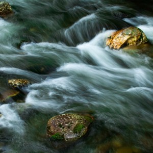 Rocks and flowing stream
