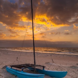Catamaran on the beach at sunrise, St. George Island, Florida